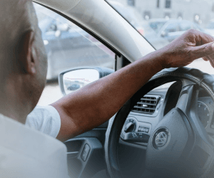 Professional driver in luxury car